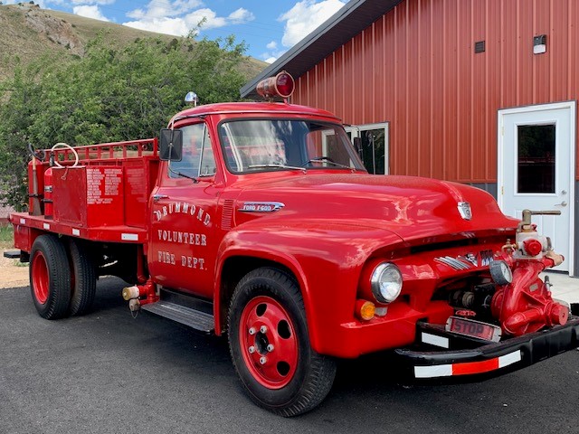 1954 Drummond Fire Truck Exterior Restored; parked in front of Drummond Fire Hall